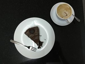 coconut cappuccino + chocolate cake at Alchemy Vegan in Chiang Mai
