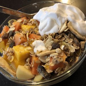 Fruit salad with coconut yoghurt and imported muesli  at Alchemy Vegan in Chiang Mai