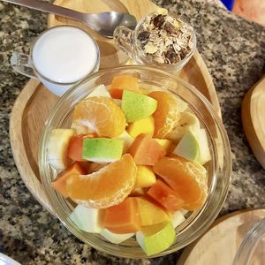 Fruit salad with muesli and coconut yoghurt  at Alchemy Vegan in Chiang Mai