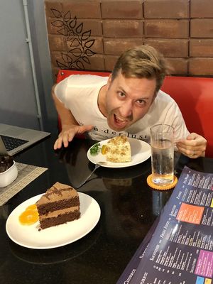 Getting the cake on!  at Alchemy Vegan in Chiang Mai