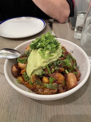 Potatoes with jalapeño and avocado cream   at Ten Foot Henry in Calgary