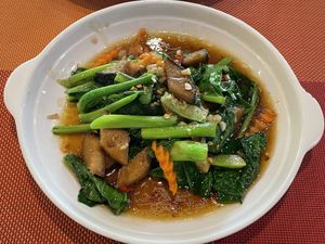 Stir-fried kale with vegan salt fish, 125 baht  at Yes Vegan in Pattaya