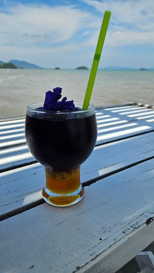 Butterfly Pea Drink with Passionfruit at Pinto Restaurant in Koh Lanta