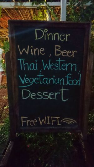 Chalkboard Sign in front of Pinto at Pinto Restaurant in Koh Lanta