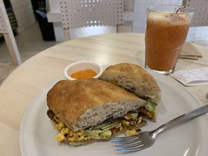 Tofu and beans sandwich with strawberry juice at Pulpa Amor Liquido  in Mexico City