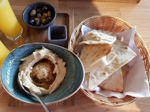 humus, pita and olives at Pepper Grey in Klaipeda