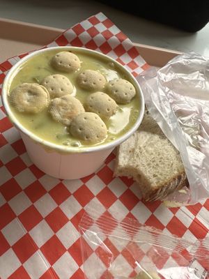 Lime and coconut chowder with oyster crackers and side of sourdough bread   at Pike Place Chowder in Seattle