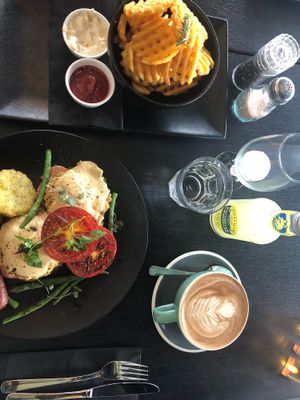 Waffle fries with vegan miso and garlic mayo and vegan eggs Benedict. Also a coconut mocha  at Raw Sugar Cafe in Christchurch