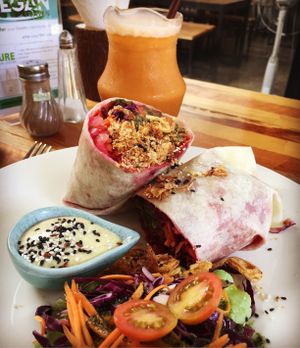 Hummus & falafel wrap and Thai-style iced tea with almond milk. at Pure Vegan Heaven @Freeative in Chiang Mai