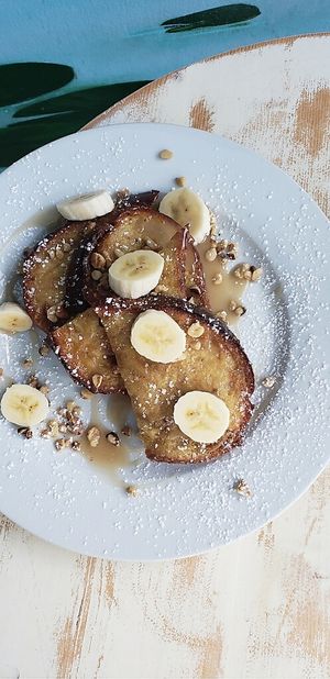 Brioche French toast with caramel sauce and coconut whipped cream at Artichoke & Vine in Boca Raton