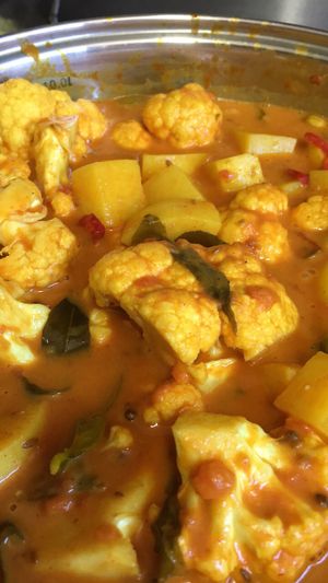 Sri Lankan Cauliflower and Potato Curry with Basmati Rice and Pappadums  at Great Nature Vegetarian Snacks and Grocery in Christies Beach