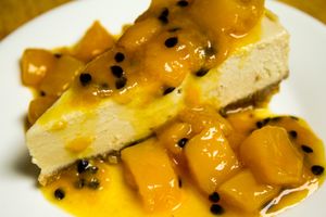 Raw Vegan Cheesecake 
Made from cashew nut, coconut oil, coconut milk, lime juice, maple syrup, vanilla extract, and with mango-passion glaze.  at Footprint Cafes in Siem Reap