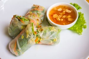 Fresh vegetables spring rolls 
Wrapped grated carrot, cucumber, long beans, basil leaf, and vermicelli 
Served with sweet and sour dressing  at Footprint Cafes in Siem Reap