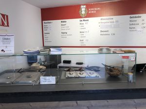 Theke mit Speisekarte / counter with menu  at Kuschari König in Cologne
