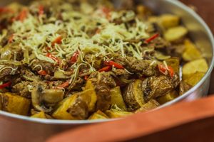 "Papitas Terroir" Rustic French fries with a seitan, onions, red bell pepper, mushrooms and liquid smoke sauté.  at Neyenmapu Vegan Bistro in Santiago