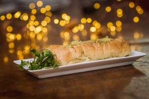 "Chihuahua" Vegan sausage rolls inside a puff pastry with vegan mozza cheese.  at Neyenmapu Vegan Bistro in Santiago