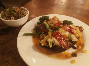 Bliss bean (aubergine with black beans and coconut yogurt, served with vegetables and quinoa on the side) at Vantra Vegan in London