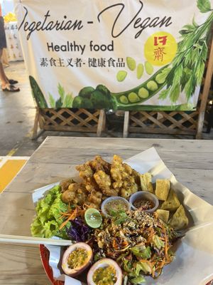Plate with three options: tofu larb, tofu fries, corn fritter   at V Secret Street Food - Food Stall in Chiang Mai