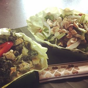 Our food, crispy mushrooms salad and tempeh spinach curry at V Secret Street Food - Food Stall in Chiang Mai