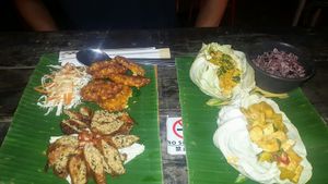 Vegan sausage, corn fritters, tempeh and spinach curry, pumpkin and tofu curry and rice. at V Secret Street Food - Food Stall in Chiang Mai