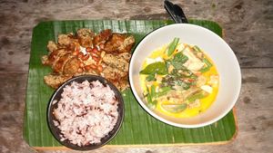 Red curry w tofu and tempeh. Rice. Vegan Chiang mai sausage, cabbage salad. 100 bhat. at V Secret Street Food - Food Stall in Chiang Mai