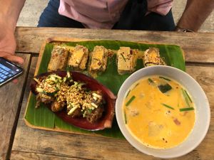 Tofu banana flower fritters (bottom left)tom sum soup (bottom right) and veggie sushi (top) at V Secret Street Food - Food Stall in Chiang Mai