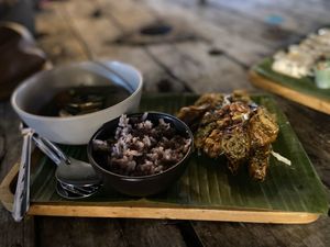 Vegetables in curry sauce with a side of rice and a spicy vegan sauce   at V Secret Street Food - Food Stall in Chiang Mai