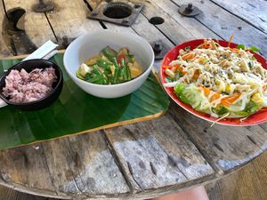 Curry with rice and big tempeh salad. at V Secret Street Food - Food Stall in Chiang Mai