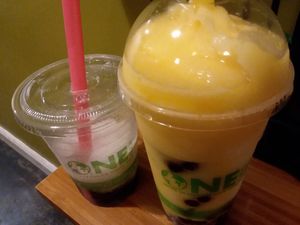 Frozen boba slushies (lychee flavor and a large mango flavor) at SpecialTEA Lounge in Miami