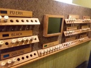 Wall of different teas at SpecialTEA Lounge in Miami