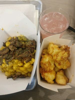 Truffle Mac and Cheese, cauliflower fritters and grapefruit soda at Parka Food Co. in Toronto