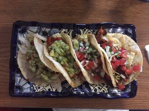 "Chorizo" based tacos and Jackfruit simmered in Guajillo-chili corn tortilla tacos. DELICIOUS!! at El Azteca Taqueria in Cape Coral