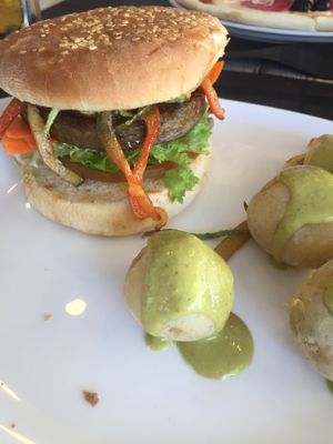 Vegan burger with Canarian potatoes and green mojo sauce at Belin Restaurante in Gran Canaria