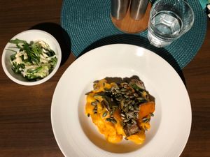 Creamy pumpkin gnocchi with seeds and salad at Alanda in Banska Bystrica