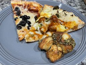 Cheese with olives, General Tso, garlic knot  at Nice Guys Pizza and Beer in Cape Coral