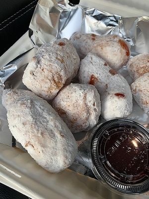 Euro trash donuts - pizza dough covered in powdered sugar with raspberry sauce at Nice Guys Pizza and Beer in Cape Coral