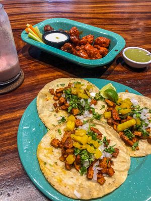 Taco options and crispy cauliflower wings at The Green Place in Puerto Vallarta
