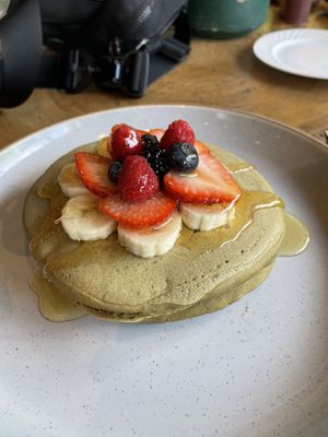 Gluten free matcha pancakes! I got agave syrup on top  at The Green Place in Puerto Vallarta