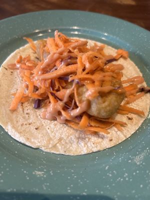 Amazing Baja Style Tacos …tofu with vegan thousand island sauce, carrots and purple cabbage.  Great hot sauces to choose from too, but try them first before committing!!  at The Green Place in Puerto Vallarta