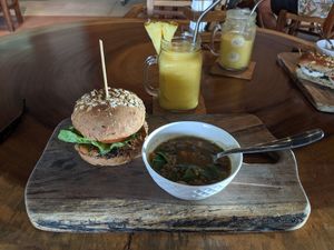 The original burger, lentil soup, and a golden milk smoothie at The Green Place in Puerto Vallarta