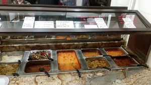 We visited this Indian Restaurant in Mesa, AZ on Dec 1, 2017 for the first time, It’s a nice place, with a dinner buffet. There are clearly marked portions of the buffet for Vegan options.
The food all tasted great, they had many Vegan options, but also some meat. They bring fresh made breads to the table as you eat. There was chai tea & mango juice as well as some sweets. Friendly staff. They were open late 10pm

More Pics 
http://whatdoyoueatthen.com/india-oven-mesa-az/ at India Oven in Mesa