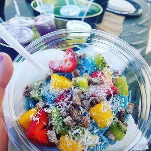 Fruddles- Rice noodles marinated in tea, agave, cinnamon with a splash of pea milk topped with dates, mango, strawberries, kiwi and shredded coconut.  at Organic Junkie in Corona