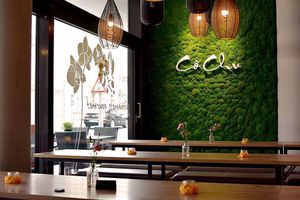 The tables in part of the restaurant at Co Chu in Berlin