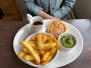 Meatless potato pie, chips, mushy peas and gravy. Delicious. at Phoenix Plant Based Eatery in Prescot