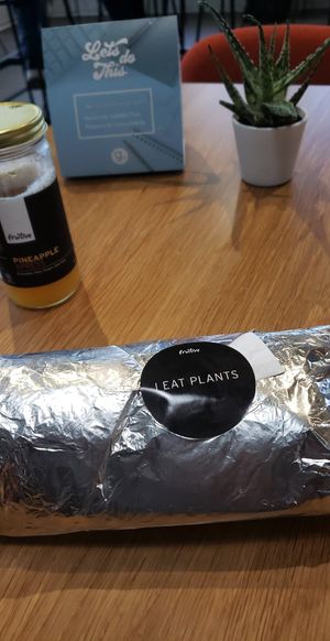 Southwest Wrap, so much food! And pineapple Express juice so good! at Fruitive - Colley Ave in Norfolk