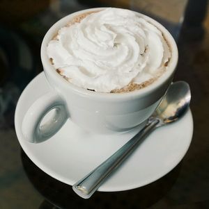 vegan Hot Chocolate with cream and marshmallows at Purple Cat Cafe in Glasgow