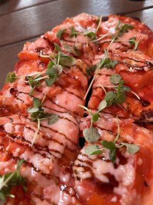 Vegan available caprese flatbread  at The Fairmount Cocktail Bar in Cleveland Heights