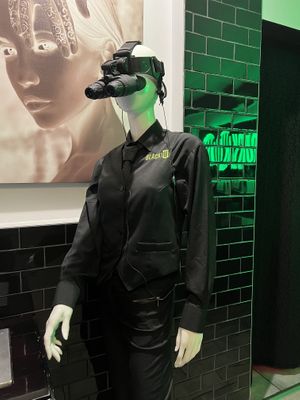 Waiter wears night vision goggles   at BLACKOUT Dining in the Dark in Las Vegas