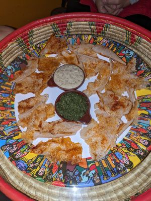 Entree dish - crispy injera with berbere, white lentil dip and spinach dip at Addis in Cape in Cape Town