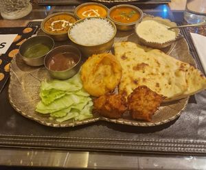 For perspective, the rice was able 4 tablespoons worth and the round dishes about 3 tables spoons of sauce, no real substance. at Kalpna in Edinburgh
